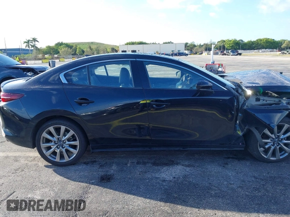 2021 Mazda 3 Premium with VIN JM1BPADL7M1303484, listed as a IAAI auction lot 41666785 with 34,476 mi miles and . Bid and sale history available at DreamBid. Image 13.