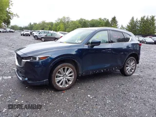 2023 Mazda CX-5 Signature with VIN JM3KFBXY4P0153335, listed as a IAAI auction lot 40053867 with 17,828 mi miles and . Bid and sale history available at carsss.com. Image 19.