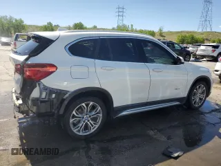2017 BMW X1 xDrive28i z VIN WBXHT3Z36H4A55751, wystawiony jako Copart lot #56922145 z przebiegiem 62 760 mil mil oraz Szkoda całkowita • Salvage title. Historia ofert i sprzedaży dostępna na DreamBid. Obrazek 3.