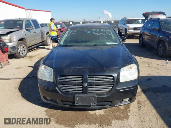 2005 Dodge Magnum SE with VIN 2D4FV48V55H661046, listed as a IAAI auction lot 41644364 with 125,400 mi miles and . Bid and sale history available at carsss.com. Image 12.