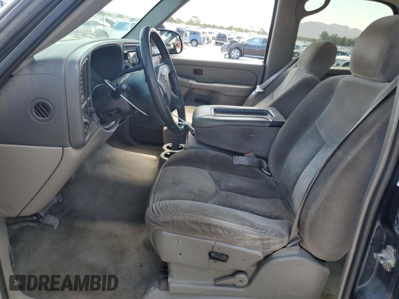 2004 Chevrolet Tahoe LS with VIN 1GNEC13T04J287145, listed as a Copart auction lot 59340645 with 179,743 mi miles and Salvage title. Bid and sale history available at DreamBid. Image 7.