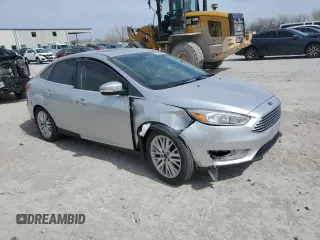 2017 Ford Focus Titanium with VIN 1FADP3J23HL347739, listed as a Copart auction lot 49385365 with 79,484 mi miles and Salvage title. Bid and sale history available at DreamBid. Image 4.