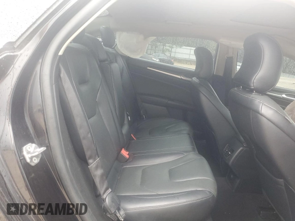 2019 Ford Fusion Titanium with VIN 3FA6P0K9XKR217324, listed as a Copart auction lot 56104185 with 135,728 mi miles and Salvage title. Bid and sale history available at DreamBid. Image 10.