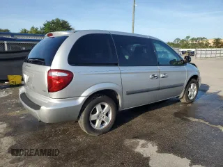 2005 Dodge Caravan SXT with VIN 1D4GP45R95B419486, listed as a Copart auction lot 60313045 with 180,615 mi miles and Salvage title. Bid and sale history available at DreamBid. Image 3.