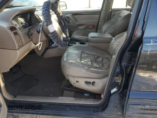 2001 Jeep Grand Cherokee Limited with VIN 1J4GW58N41C636179, listed as a Copart auction lot 88356915 with 184,243 mi miles and Clean Title. Bid and sale history available at carsss.com. Image 7.