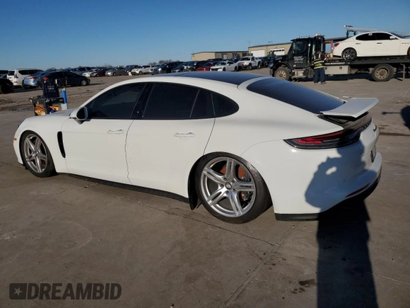 2022 Porsche Panamera z VIN WP0AJ2A73NL100639, wystawiony jako Copart lot #81958053 z przebiegiem 3 399 mil mil oraz Czysty tytuł • Clean title. Historia ofert i sprzedaży dostępna na DreamBid. Obrazek 2.