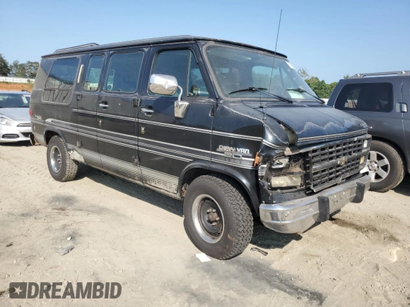 1994 Chevrolet Chevy Van z VIN 1GBEG25K3RF178166, wystawiony jako Copart lot #69173594 z przebiegiem 143 577 mil mil oraz Szkody całkowita. Historia ofert i sprzedaży dostępna na DreamBid. Obrazek 4.