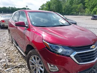 2018 Chevrolet Equinox LT z VIN 3GNAXJEV9JL412472, wystawiony jako IAAI lot #42133976 z przebiegiem 75 718 mil mil oraz . Historia ofert i sprzedaży dostępna na DreamBid. Obrazek 1.