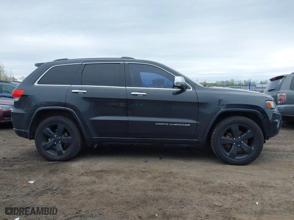 2014 Jeep Grand Cherokee Overland with VIN 1C4RJFCG6EC121654, listed as a IAAI auction lot 42051730 with 163,853 mi miles. Bid and sale history available at carsss.com. Image 13.