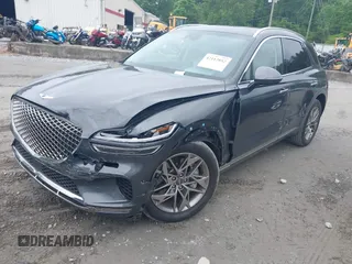 2023 Genesis GV70 2.5T z VIN KMUMADTB7PU103287, wystawiony jako IAAI lot #42112852 z przebiegiem 27 535 mil mil oraz . Historia ofert i sprzedaży dostępna na DreamBid. Obrazek 2.