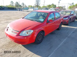 2010 Chevrolet Cobalt 1LT with VIN 1G1AD5F54A7146587, listed as a IAAI auction lot 41879398 with 142,200 mi miles and . Bid and sale history available at DreamBid. Image 2.