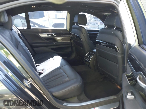 2019 BMW 7 Series 740i with VIN WBA7E2C53KB218375, listed as a IAAI auction lot 42008827 with 61,337 mi miles and . Bid and sale history available at DreamBid. Image 8.