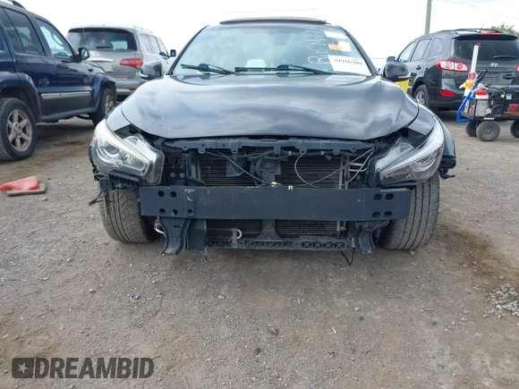 2014 Infiniti Q50 Premium z VIN JN1BV7AP9EM690929, wystawiony jako IAAI lot #39916709 z przebiegiem Nie podano mil oraz . Historia ofert i sprzedaży dostępna na DreamBid. Obrazek 6.