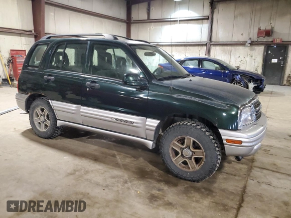 2002 Chevrolet Tracker LT z VIN 2CNBJ634126949974, wystawiony jako Copart lot #54819695 z przebiegiem 200 895 mil mil oraz Szkoda całkowita • Salvage title. Historia ofert i sprzedaży dostępna na DreamBid. Obrazek 4.