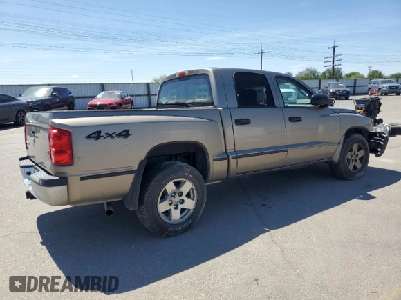 2006 Dodge Dakota SLT z VIN 1D7HW48NX6S709353, wystawiony jako Copart lot #58043225 z przebiegiem 222 008 mil mil oraz Szkoda całkowita • Salvage title. Historia ofert i sprzedaży dostępna na DreamBid. Obrazek 3.