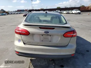 2015 Ford Focus Titanium с VIN 1FADP3J28FL288037, выставлен на аукционе Copart как лот 56972865 с пробегом 75 703 миль миль и Списание • Salvage title. История ставок и продаж доступна на DreamBid. Изображение 6.