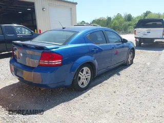 2010 Dodge Avenger SXT with VIN 1B3CC4FB0AN114512, listed as a IAAI auction lot 42007745 with 110,242 mi miles and . Bid and sale history available at carsss.com. Image 4.
