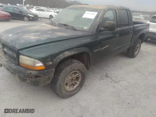 2000 Dodge Dakota Sport with VIN 1B7HG2AZ6YS661541, listed as a IAAI auction lot 41674406 with 204,117 mi miles. Bid and sale history available at carsss.com. Image 18.