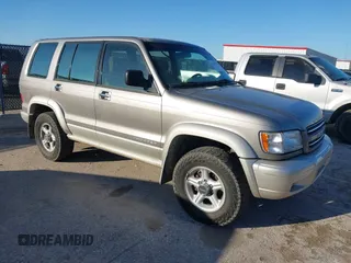 2002 Isuzu Trooper S with VIN JACDS58X227J01706, listed as a IAAI auction lot 41489087 with 197,538 mi miles and . Bid and sale history available at DreamBid. Image 1.