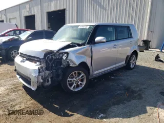 2012 Scion xB z VIN JTLZE4FE1C1145263, wystawiony jako Copart lot #60968705 z przebiegiem 158 151 mil mil oraz Szkoda całkowita • Salvage title. Historia ofert i sprzedaży dostępna na DreamBid. Obrazek 1.