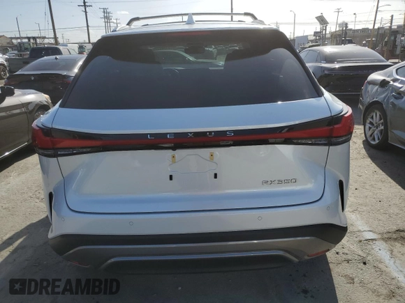 2024 Lexus RX 350 z VIN JTJCHMAA0R2015035, wystawiony jako Copart lot #51782225 z przebiegiem 9 880 mil mil oraz Szkoda całkowita • Salvage title. Historia ofert i sprzedaży dostępna na DreamBid. Obrazek 6.