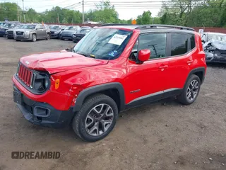 2015 Jeep Renegade Latitude z VIN ZACCJBBT1FPB33219, wystawiony jako IAAI lot #42219442 z przebiegiem 171 868 mil mil oraz . Historia ofert i sprzedaży dostępna na DreamBid. Obrazek 2.