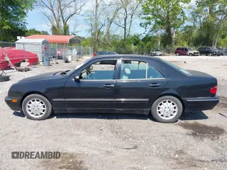 2000 Mercedes-Benz E 320 with VIN WDBJF65J2YB105399, listed as a IAAI auction lot 42076107 with 277,701 mi miles and . Bid and sale history available at DreamBid. Image 14.