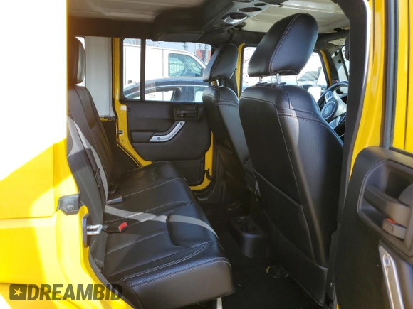 2015 Jeep Wrangler Unlimited Rubicon with VIN 1C4BJWFG1FL662478, listed as a Copart auction lot 48887295 with 95,826 mi miles and Clean Title. Bid and sale history available at carsss.com. Image 11.