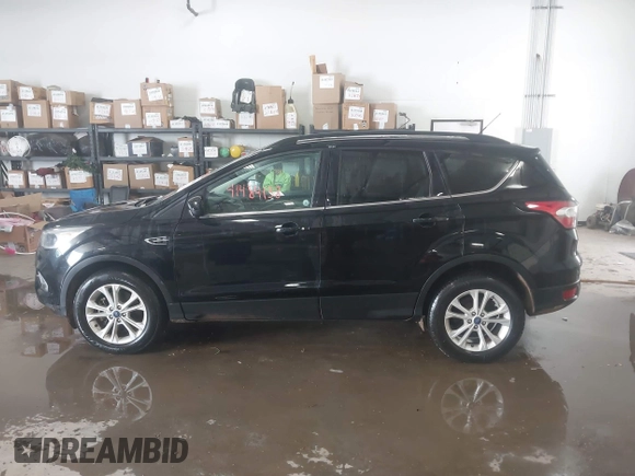 2018 Ford Escape SE with VIN 1FMCU0G99JUC89312, listed as a IAAI auction lot 41484138 with 149,739 mi miles. Bid and sale history available at carsss.com. Image 14.