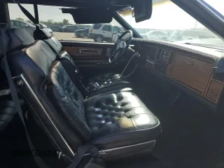 1985 Cadillac Eldorado z VIN 1G6EL5780FE622179, wystawiony jako Copart lot #54109205 z przebiegiem 73 403 mil mil oraz Szkoda całkowita • Salvage title. Historia ofert i sprzedaży dostępna na DreamBid. Obrazek 7.