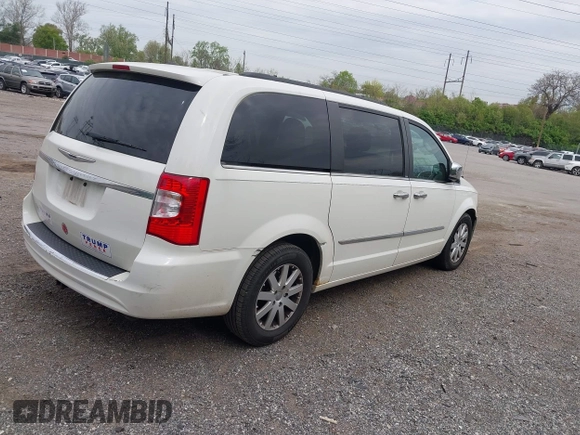 2013 Chrysler Town & Country Touring with VIN 2C4RC1BG2DR632444, listed as a IAAI auction lot 41989048 with 99,668 mi miles. Bid and sale history available at carsss.com. Image 4.