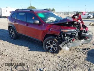 2014 Jeep Cherokee Trailhawk z VIN 1C4PJMBS8EW186277, wystawiony jako IAAI lot #41245653 z przebiegiem Nie podano mil oraz . Historia ofert i sprzedaży dostępna na DreamBid. Obrazek 1.