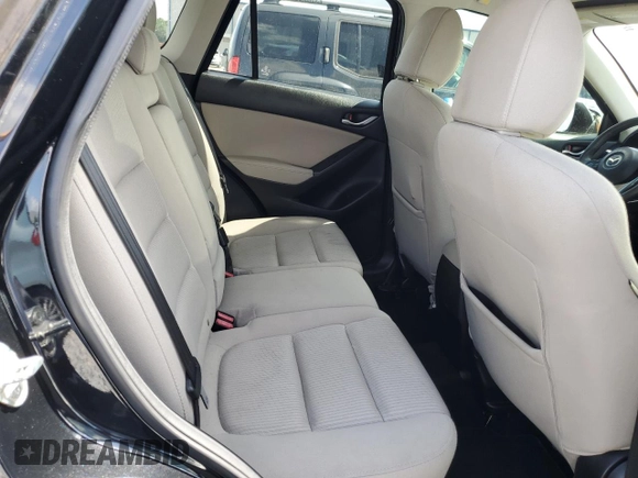 2014 Mazda CX-5 Touring z VIN JM3KE2CY8E0326988, wystawiony jako Copart lot #60473715 z przebiegiem 231 055 mil mil oraz Czysty tytuł • Clean title. Historia ofert i sprzedaży dostępna na DreamBid. Obrazek 11.