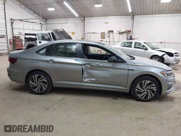 2021 Volkswagen Jetta SEL with VIN 3VWE57BUXMM056379, listed as a IAAI auction lot 42456450 with 34,697 mi miles and . Bid and sale history available at DreamBid. Image 12.