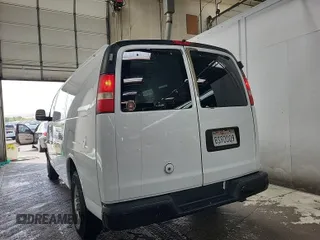 2009 Chevrolet Express Cargo Van with VIN 1GCGG25C591120988, listed as a IAAI auction lot 42174695 with 142,383 mi miles. Bid and sale history available at carsss.com. Image 1.