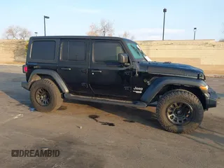 2020 Jeep Wrangler Unlimited Sport S with VIN 1C4HJXDG5LW170579, listed as a IAAI auction lot 41429548 with Not provided miles and . Bid and sale history available at DreamBid. Image 13.