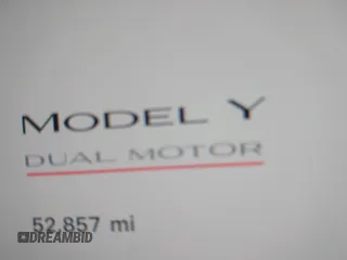 2023 Tesla Model Y Performance with VIN 7SAYGDEF9PF582908, listed as a IAAI auction lot 41930957 with 52,857 mi miles and . Bid and sale history available at DreamBid. Image 14.