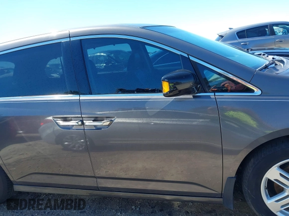 2012 Honda Odyssey Touring with VIN 5FNRL5H91CB057344, listed as a IAAI auction lot 41835272 with 158,854 mi miles. Bid and sale history available at carsss.com. Image 13.