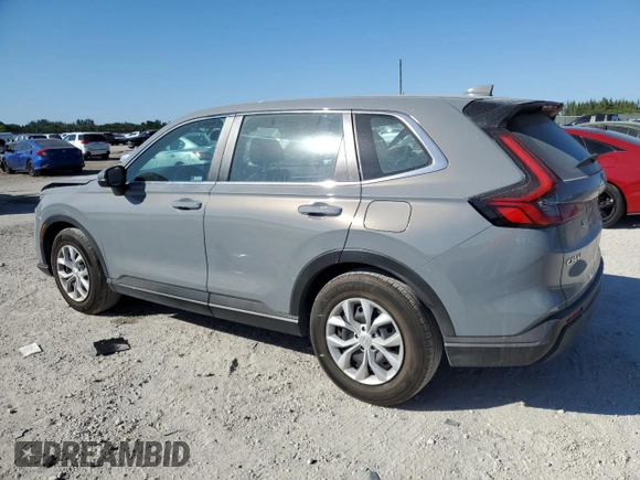 2024 Honda CR-V LX with VIN 2HKRS3H27RH317587, listed as a Copart auction lot 82719674 with 13,509 mi miles and Salvage Title. Bid and sale history available at DreamBid. Image 2.