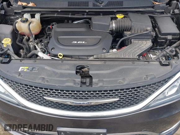 2017 Chrysler Pacifica Touring L with VIN 2C4RC1BGXHR667397, listed as a IAAI auction lot 42085117 with 63,996 mi miles and . Bid and sale history available at DreamBid. Image 10.