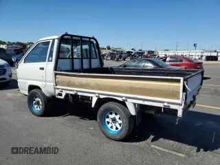 1994 Toyota Tacoma with VIN CM600012981, listed as a Copart auction lot 64052155 with 237,536 mi miles and Salvage title. Bid and sale history available at DreamBid. Image 2.
