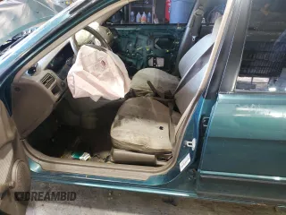 1996 Toyota Tercel DX z VIN JT2BC52L7T7044201, wystawiony jako Copart lot #77190074 z przebiegiem Nie podano mil oraz Szkoda całkowita • Salvage title. Historia ofert i sprzedaży dostępna na DreamBid. Obrazek 7.
