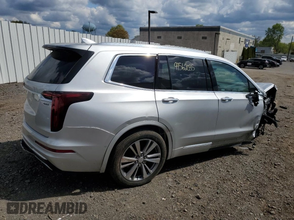 2020 Cadillac XT6 AWD Premium Luxury z VIN 1GYKPDRS0LZ122836, wystawiony jako Copart lot #49836373 z przebiegiem Nie podano mil oraz . Historia ofert i sprzedaży dostępna na DreamBid. Obrazek 3.