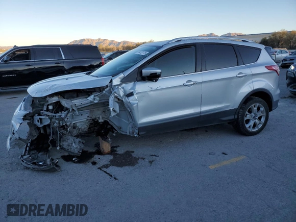 2016 Ford Escape Titanium with VIN 1FMCU9J95GUA69932, listed as a Copart auction lot 88470175 with 108,471 mi miles and Salvage title. Bid and sale history available at DreamBid. Image 1.