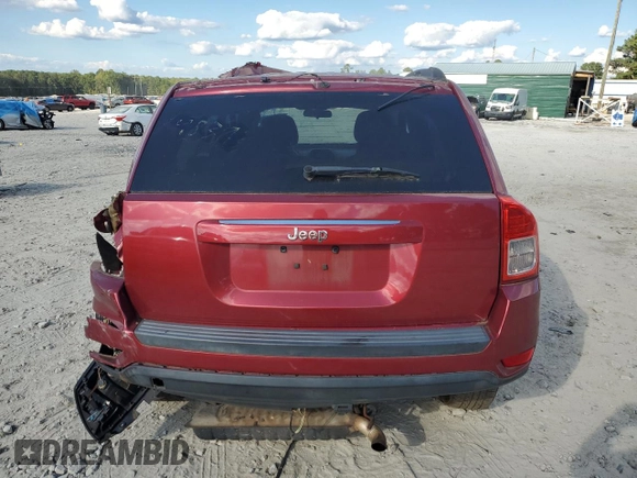 2011 Jeep Compass with VIN 1J4NT1FB4BD194839, listed as a Copart auction lot 73001014 with 113,050 mi miles and Salvage Title. Bid and sale history available at carsss.com. Image 6.