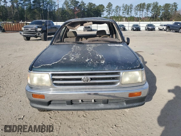 1995 Toyota T100 DX with VIN JT4VD12E1S0012010, listed as a Copart auction lot 83223154 with 253,492 mi miles and Salvage Title. Bid and sale history available at DreamBid. Image 5.