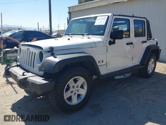 2007 Jeep Wrangler Unlimited X with VIN 1J4GB39147L133997, listed as a IAAI auction lot 41676009 with 110,849 mi miles and . Bid and sale history available at DreamBid. Image 17.