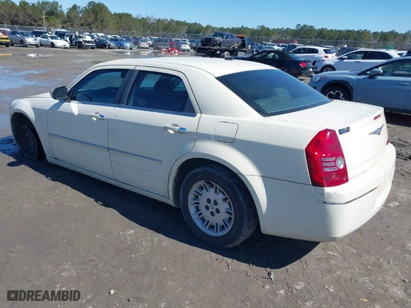 2008 Chrysler 300 Touring with VIN 2C3LA53G58H165408, listed as a IAAI auction lot 41644323 with 127,733 mi miles. Bid and sale history available at carsss.com. Image 3.