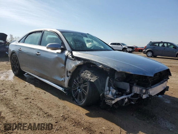 2012 Audi A8 with VIN WAURVAFD8CN018131, listed as a Copart auction lot 54260395 with 98,706 mi miles and Salvage title. Bid and sale history available at DreamBid. Image 4.