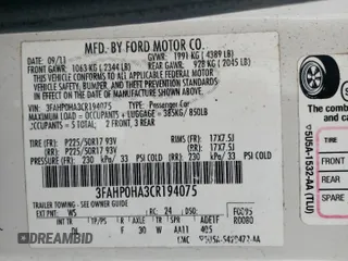 2012 Ford Fusion SE z VIN 3FAHP0HA3CR194075, wystawiony jako Copart lot #63380895 z przebiegiem 176 634 mil mil oraz Szkoda całkowita • Salvage title. Historia ofert i sprzedaży dostępna na DreamBid. Obrazek 12.